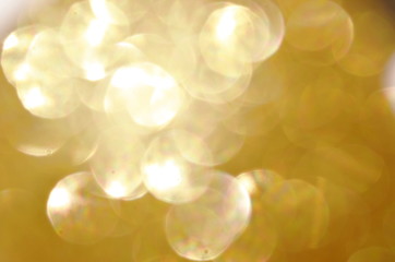 blurry golden shiny light background and texture