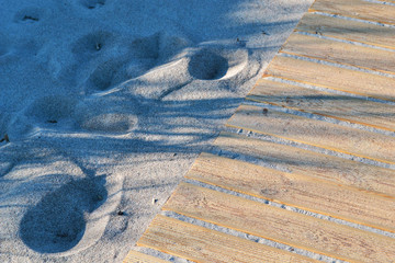 12..Footprints in the sand on the beach in the dunes of the Baltic Sea
