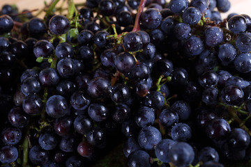 Black grape on table