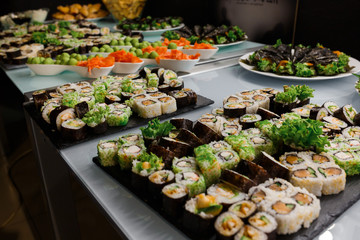 Different rolls background. Traditional sushi. Delicious japanese food.