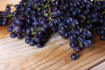 Black grape on table