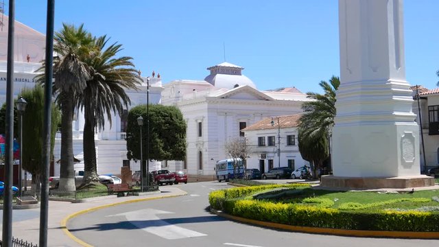 Sucre Bolivia freedom square obelisk and big Mariscal theater