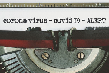 Corona Virus typed words on a vintage typewriter. corona virus-covid 19