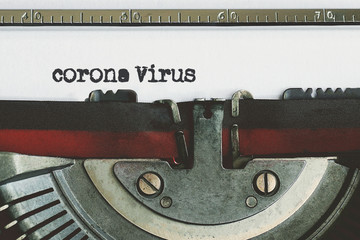 Corona Virus typed words on a vintage typewriter. corona virus-covid 19