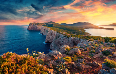 Panotamic view of Caccia cape. Astonishing spring sunrise on Sardinia island, Italy, Europe....