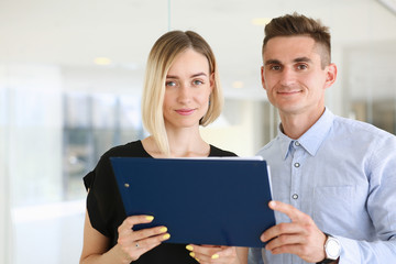 Fototapeta premium Beautiful woman portrait at workplace examining financial statistics. White collar worker at workspace, exchange market, startup, irs, certified public accountant, internal Revenue officer concept