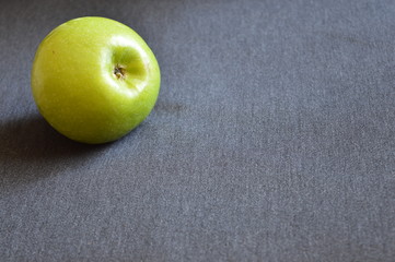 green apple on black background