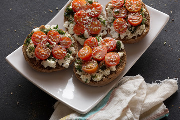 Tasty vegetarian bruschettas on a white dish. bruschetta