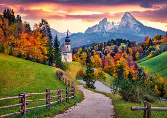 Peel and stick wall murals Landscape Iconic picture of Bavaria with Maria Gern church with Hochkalter peak on background. Fantastic autumn sunrise in Alps. Superb evening landscape of Germany countryside. Traveling concept background..