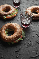 Healthy snack. Bagels with salmon and arugula