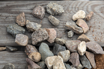 pile of stones on wooden table