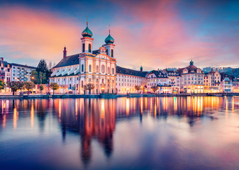 Fototapeta na wymiar Incredible evening view of Jesuitenkirche Church. Spectacular autumn cityscape of Lucerne. Stunning outdoor view of Switzerland, Europe. Traveling concept background..