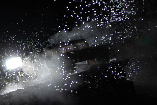 Model landrover in dramatic weather