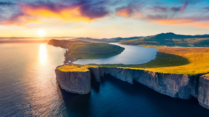 View from flying drone. Splendid evening scene of Sorvagsvatn lake, Vagar, Faroe Islands, Denmark, Europe. Unbelievable summer sunset on Atlantic Ocean. Incomparable beauty of the north. © Andrew Mayovskyy