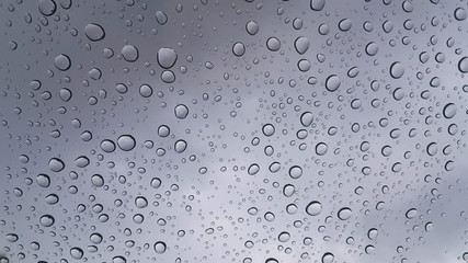 Close up water droplets on the glass, Rain drops on the glass