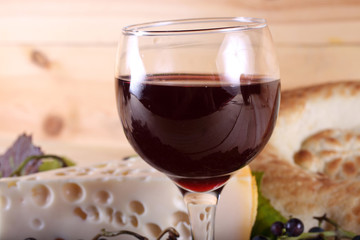 Wine, grape, cheese and bread