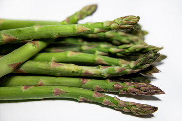 Asparagus. Fresh Asparagus. Green Asparagus. Bunches of green asparagus on the white background