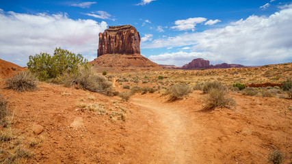 hiking the wildcat trail in the monument valley, usa