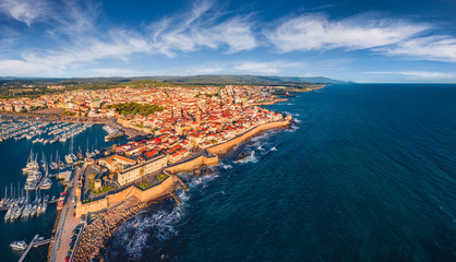 View from flying drone. Wonderful summer cityscape of Alghero port, Province of Sassari, Italy,...
