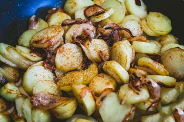 Fried potatoes with onions and garlic