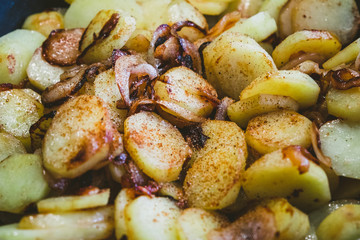 Fried potatoes with onions and garlic