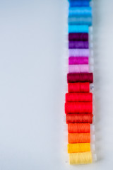 Accessories for sewing. Colored spools of thread