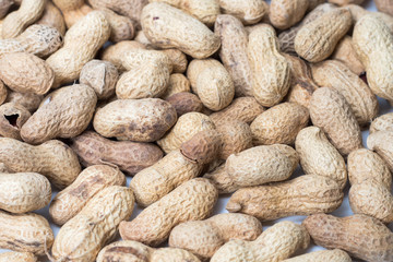 peanut in a shell texture. food background of peanuts