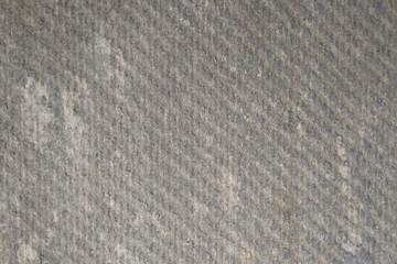 Texture of flat slate. Monochrome background of grey slate. 