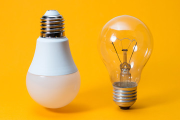 Light bulbs. isolated of Incandescent bulbs, fluorescent bulbs, orange old generation bulb, Tungsten bulb, and white energy saving bulb