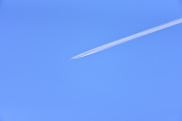 airplane and contrail