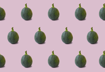 Zucchini pattern isolated on purple background. Fresh food. Diet.