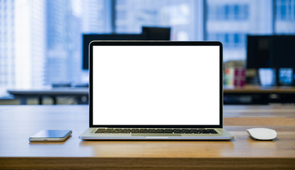 Fototapeta premium front view of laptop with blank screen on the table with mouse and mobile phone