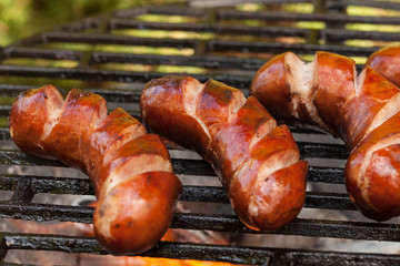 Grilling sausages.