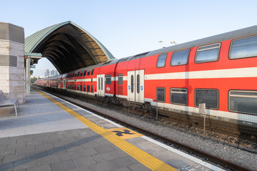 Fototapeta premium A train stands at Tel Aviv University Station on the Israeli Railway in Tel Aviv