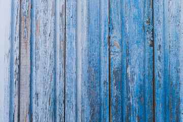 Fototapeta na wymiar Blue old painted wooden wall
