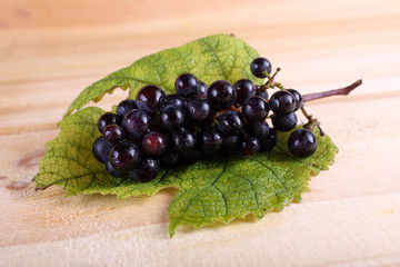 Black grape on table