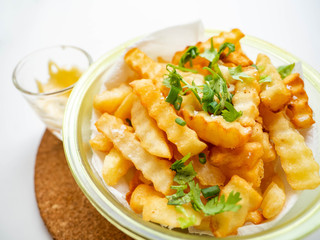 French fries golden brown, fried with oil and sprinkled with salt, sweet and salty