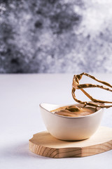 Cooking process dalgona coffee on a light background