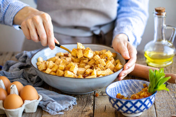 ale filling with cinnamon and raisins for strudel.Cooking strudel.Cooking apple pie at home. Sliced ​​apples in a bowl with cinnamon and sugar.Cooking together at home. Ingredients for the pie. 