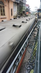 train crossing train street in hanoi