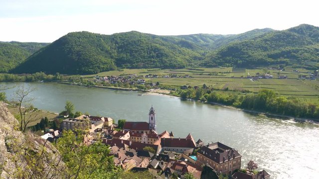 Durnstein Town in the Wachau Valley with Blue and White Tower of the Abbey Church Zoom In and River Danube from Above