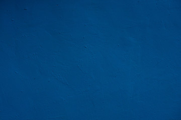 blue painted plaster wall