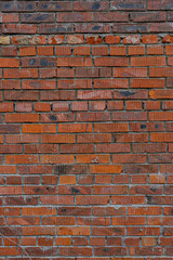 old abandoned red brick wall