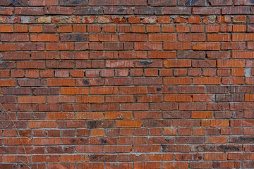 old abandoned red brick wall