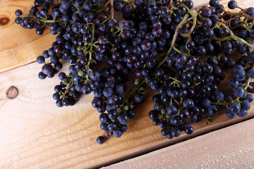 Black wine grape on table