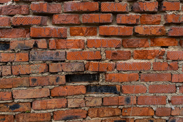 old crumbling abandoned brick wall