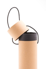 Cylindrical paper box on a white background