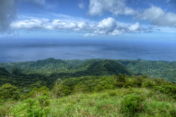 Fototapeta na wymiar panoramic view on the vulcano on montagne pelée with clowd and Martinique Sea