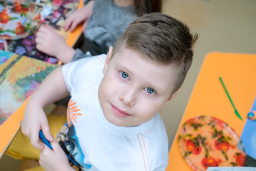 boy looking up smiling