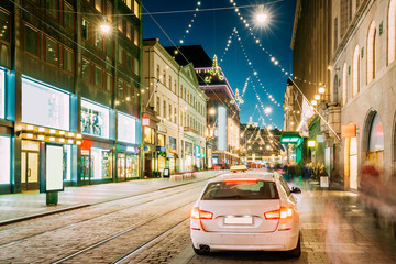 Helsinki, Finland. Taxi Car Parking On Aleksanterinkatu Street. Xmas Christmas Lights Decorations And Festive Illumination. Winter Christmas Xmas Holiday Season